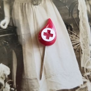 Vintage Red Cross drop of blood lapel pin red plastic donation